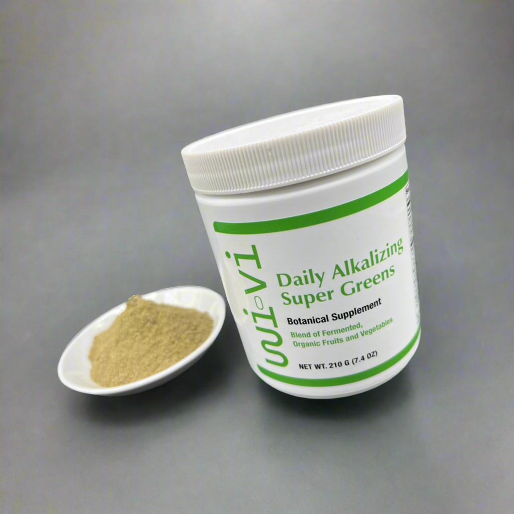 Daily greens with powder on a grey surface