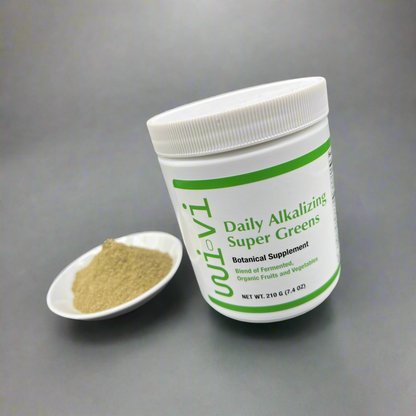 Daily greens with powder on a grey surface